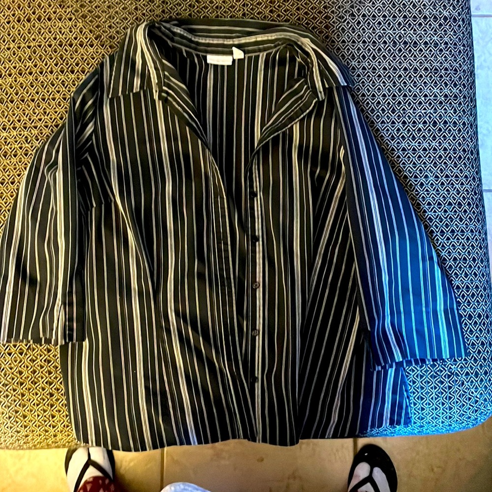 Mid length sleeve, striped, collared woman’s top